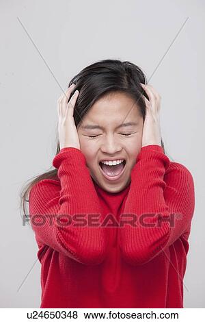 Portrait of teenage girl (16-17) in distress View Large Photo Image Stock Photo - Portrait of teenage girl (16-17) in distress. Fotosearch