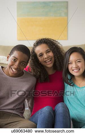 Portrait of three friends (12-13, 14-15, 16-17) View Large Photo Image Stock Image - Portrait of three friends (12-13, 14-15, 16-17). Fotosearch