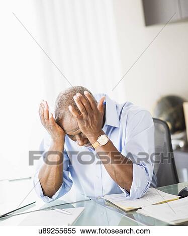 Portrait of tired senior man in office View Large Photo Image Stock Photography - Portrait of tired senior man in office. Fotosearch