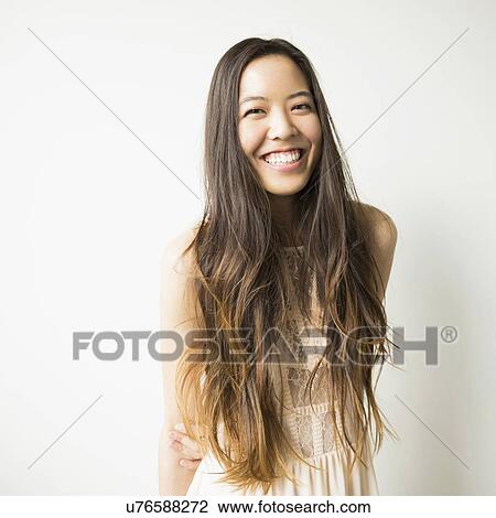 Portrait of woman with long brown hair View Large Photo Image Stock Image - Portrait of woman with long brown hair. Fotosearch