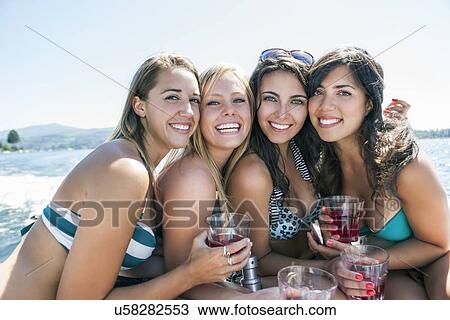 Portrait of young beautiful women smiling View Large Photo Image Stock Image - Portrait of young beautiful women smiling. Fotosearch