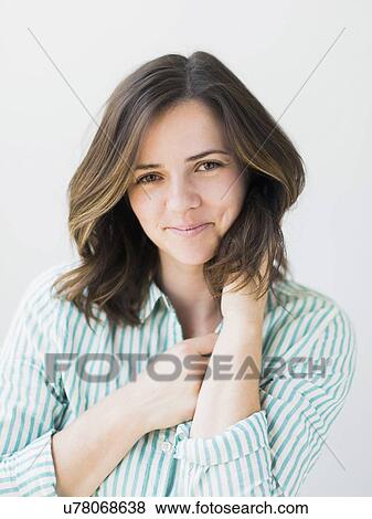 Portrait of young woman smiling View Large Photo Image Stock Photo - Portrait of young woman smiling. Fotosearch