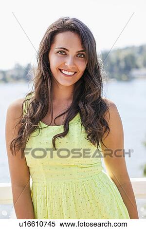 Portrait of young woman smiling View Large Photo Image Stock Photography - Portrait of young woman smiling. Fotosearch