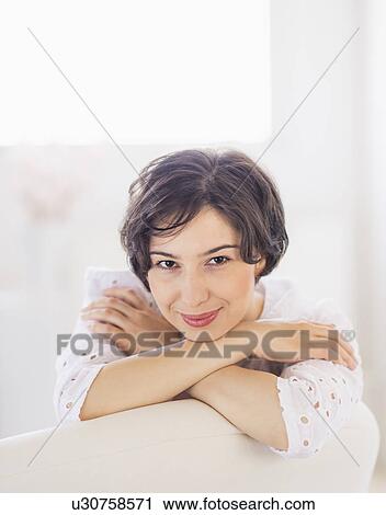 Stock Image - Portrait of young woman . Fotosearch
