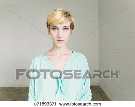 Stock Image - Portrait of young woman. Fotosearch