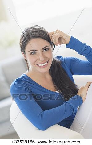 Stock Photograph - Portrait of young woman. Fotosearch