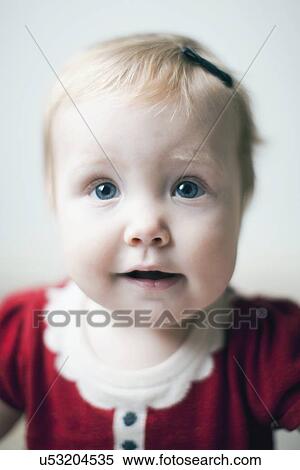 Studio portrait of baby girl (6-11 months) View Large Photo Image Stock Photography - Studio portrait of baby girl (6-11 months). Fotosearch