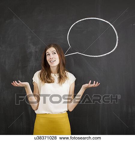Studio portrait of woman with chalk speech bubble View Large Photo Image Stock Photo - Studio portrait of woman with chalk speech bubble. Fotosearch