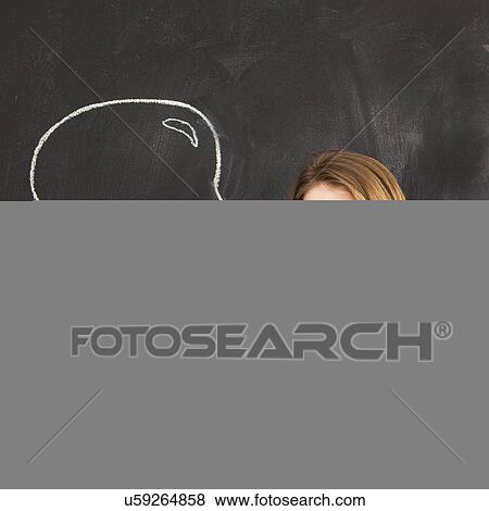 Studio portrait of woman with chalk speech bubble View Large Photo Image Stock Photo - Studio portrait of woman with chalk speech bubble. Fotosearch