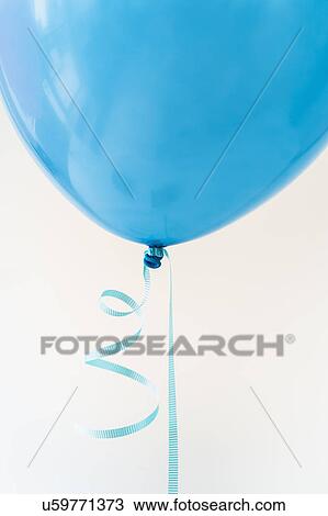 Studio shot of blue balloon View Large Photo Image Stock Image - Studio shot of blue balloon. Fotosearch