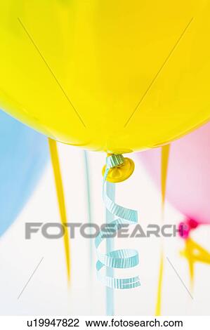 Stock Image - Studio shot of bunch of balloons. Fotosearch