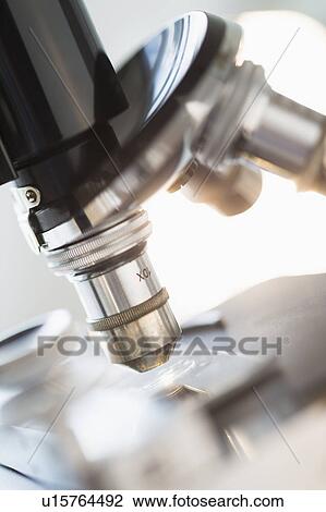 Stock Image - Studio shot of microscope, close-up. Fotosearch