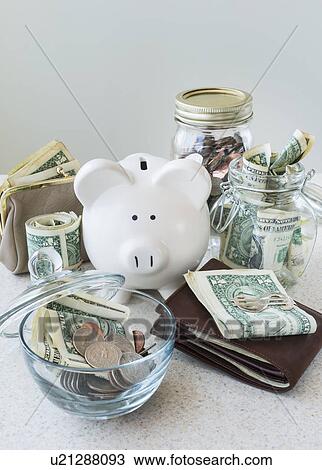 Studio shot of savings in jars View Large Photo Image Stock Image - Studio shot of savings in jars. Fotosearch