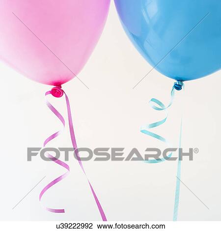 Studio shot of two balloons View Large Photo Image Stock Image - Studio shot of two balloons. Fotosearch