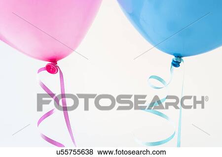 Studio shot of two balloons View Large Photo Image Stock Photo - Studio shot of two balloons. Fotosearch