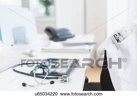 Tablet pc in doctor's office View Large Photo Image Stock Image - Tablet pc in doctor's office. Fotosearch