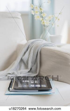 Tablet pc on armchair View Large Photo Image Picture - Tablet pc on armchair. Fotosearch