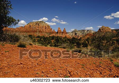 View of desert and red rocks View Large Photo Image Stock Image - View of desert and red rocks. Fotosearch