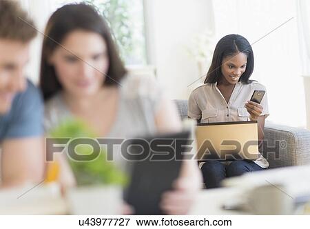Women and man using laptop and digital tablet View Large Photo Image Stock Photo - Women and man using laptop and digital tablet. Fotosearch