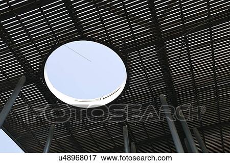 Stock Photo - Circular hole in wooden walking deck. Fotosearch