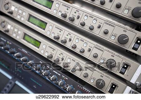 Close-up of audio recording equipment in control room View Large Photo Image Stock Image - Close-up of audio recording equipment in control room. Fotosearch