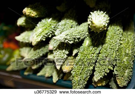 Stock Photo - Close-up of fresh goyas in supermarket. Fotosearch