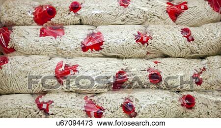 Close-up of mops in packet at supermarket View Large Photo Image Stock Image - Close-up of mops in packet at supermarket. Fotosearch