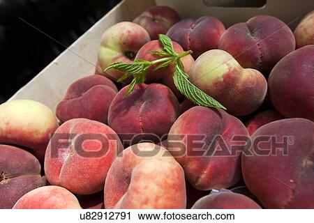 Stock Image - Close up of peaches. Fotosearch