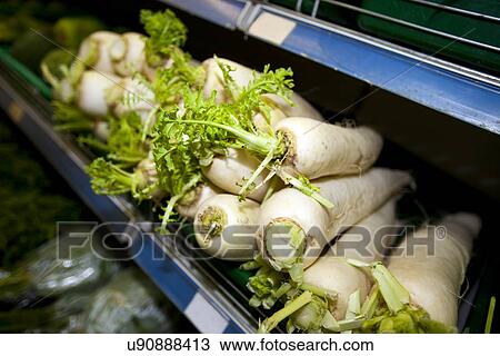 Close-up of radishes on shelf in supermarket View Large Photo Image Stock Image - Close-up of radishes on shelf in supermarket. Fotosearch