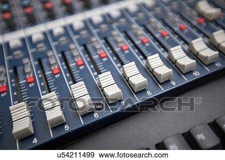 Close-up of sound mixing equipment in television studio View Large Photo Image Stock Photo - Close-up of sound mixing equipment in television studio. Fotosearch