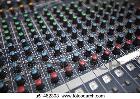 Stock Image - Close-up of sound recording equipment in studio. Fotosearch