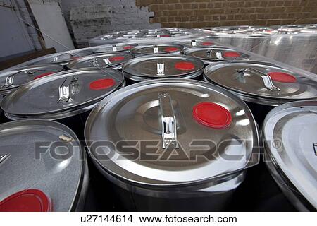 Close-up of tins outside warehouse View Large Photo Image Picture - Close-up of tins outside warehouse. Fotosearch