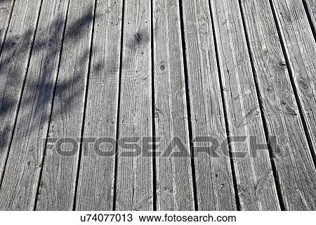 Stock Image - Close-up of wooden boardwalk. Fotosearch