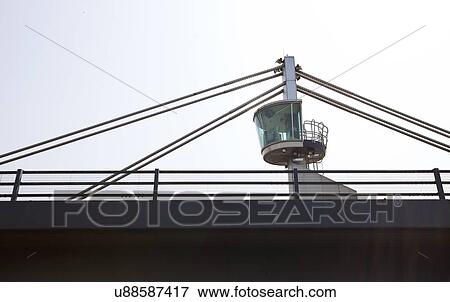 Close-up view of a control tower on top of a bridge View Large Photo Image Stock Photo - Close-up view of a control tower on top of a bridge. Fotosearch