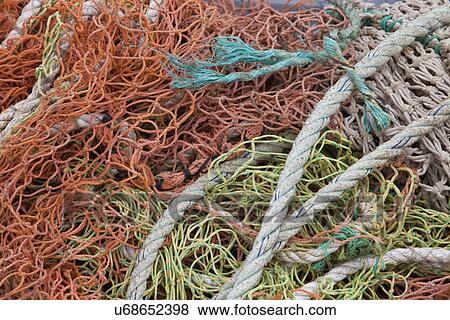 Stock Photo - Close-up view of fishing rope and nets. Fotosearch