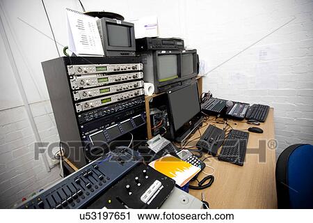 Stock Image - Computer and electric equipment in television studio. Fotosearch