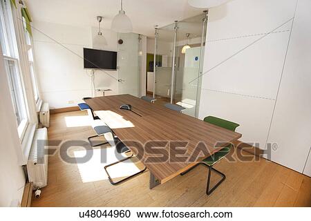 Conference table and chairs in office View Large Photo Image Stock Image - Conference table and chairs in office. Fotosearch