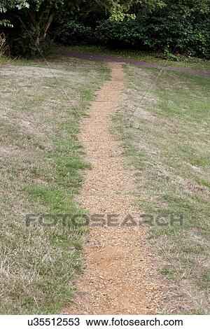 Stock Image - Country Lane in British Countryside. Fotosearch
