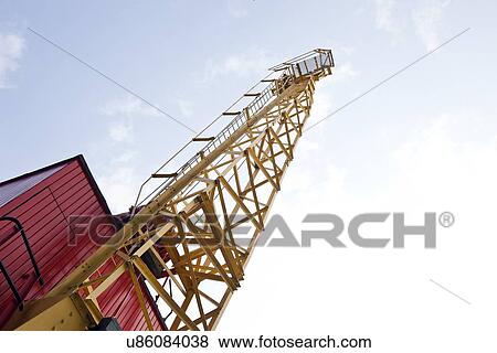 Crane above construction sites View Large Photo Image Stock Photo - Crane above construction sites. Fotosearch