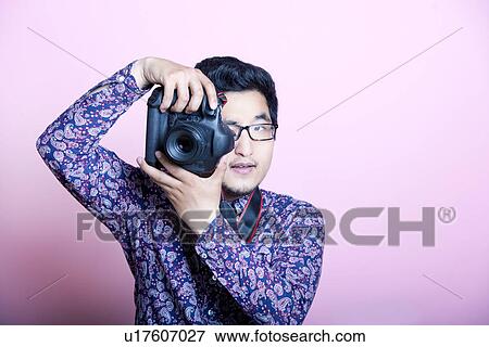 Creative Asian Photographer View Large Photo Image Stock Photo - Creative Asian Photographer . Fotosearch