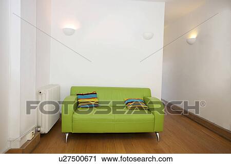 Cushions on green sofa in empty office View Large Photo Image Stock Image - Cushions on green sofa in empty office. Fotosearch