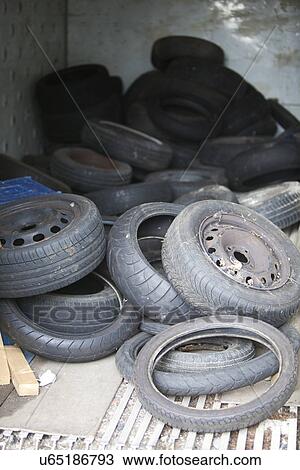 Discarded Rubber Tyres at local recycling center View Large Photo Image Stock Image - Discarded Rubber Tyres at local recycling center. Fotosearch