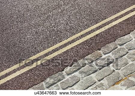 Double yellow line on street View Large Photo Image Stock Image - Double yellow line on street. Fotosearch