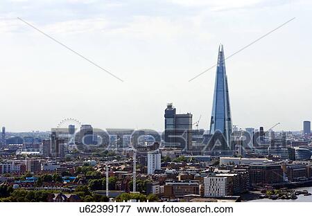 Stock Photo - Elevated view of The Shard and London Eye, London. Fotosearch