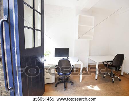 Stock Photography - Empty office with chairs and tables. Fotosearch