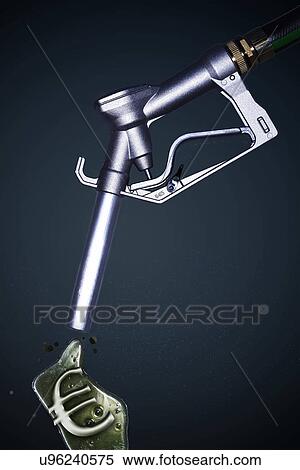 Fuel hose dripping petrol oil in the shape of the Euro Symbol View Large Photo Image Stock Photography - Fuel hose dripping petrol oil in the shape of the Euro Symbol. Fotosearch