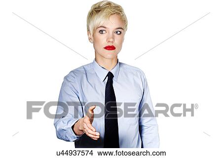 Picture - Funky Caucasian business woman offering her hand. Fotosearch