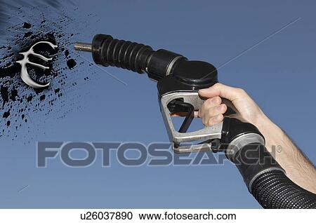 Hand holding Fuel hose spraying petrol oil in the shape of the Euro Symbol View Large Photo Image Stock Image - Hand holding Fuel hose spraying petrol oil in the shape of the Euro Symbol. Fotosearch