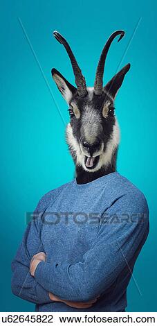Head of a Goat on a man's body View Large Photo Image Stock Image - Head of a Goat on a man's body. Fotosearch