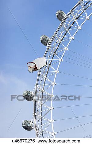 Large Ferris Wheel with a large basketball board and hoop attached View Large Photo Image Stock Photograph - Large Ferris Wheel with a large basketball board and hoop attached . Fotosearch